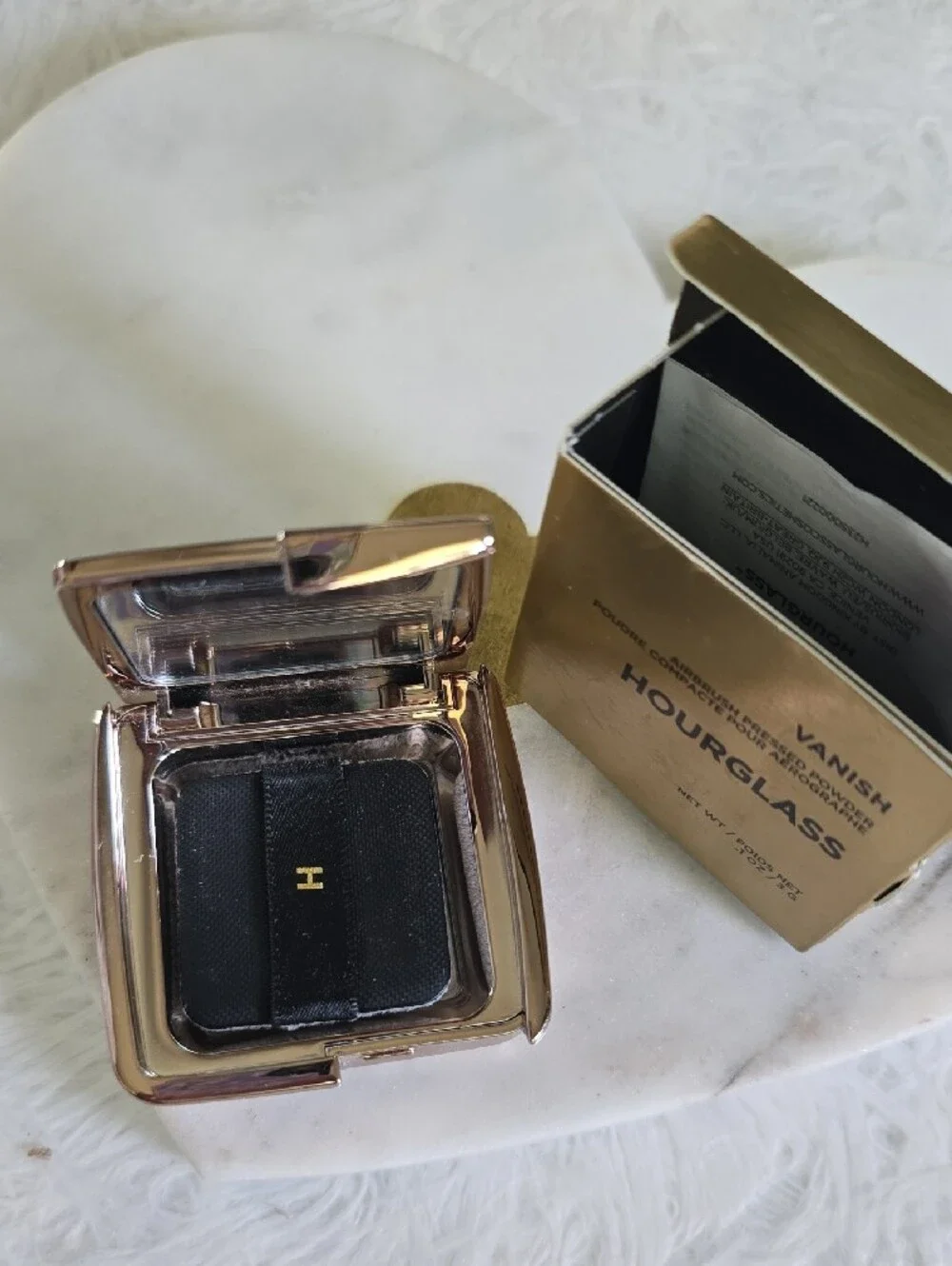 Hourglass compact pressed